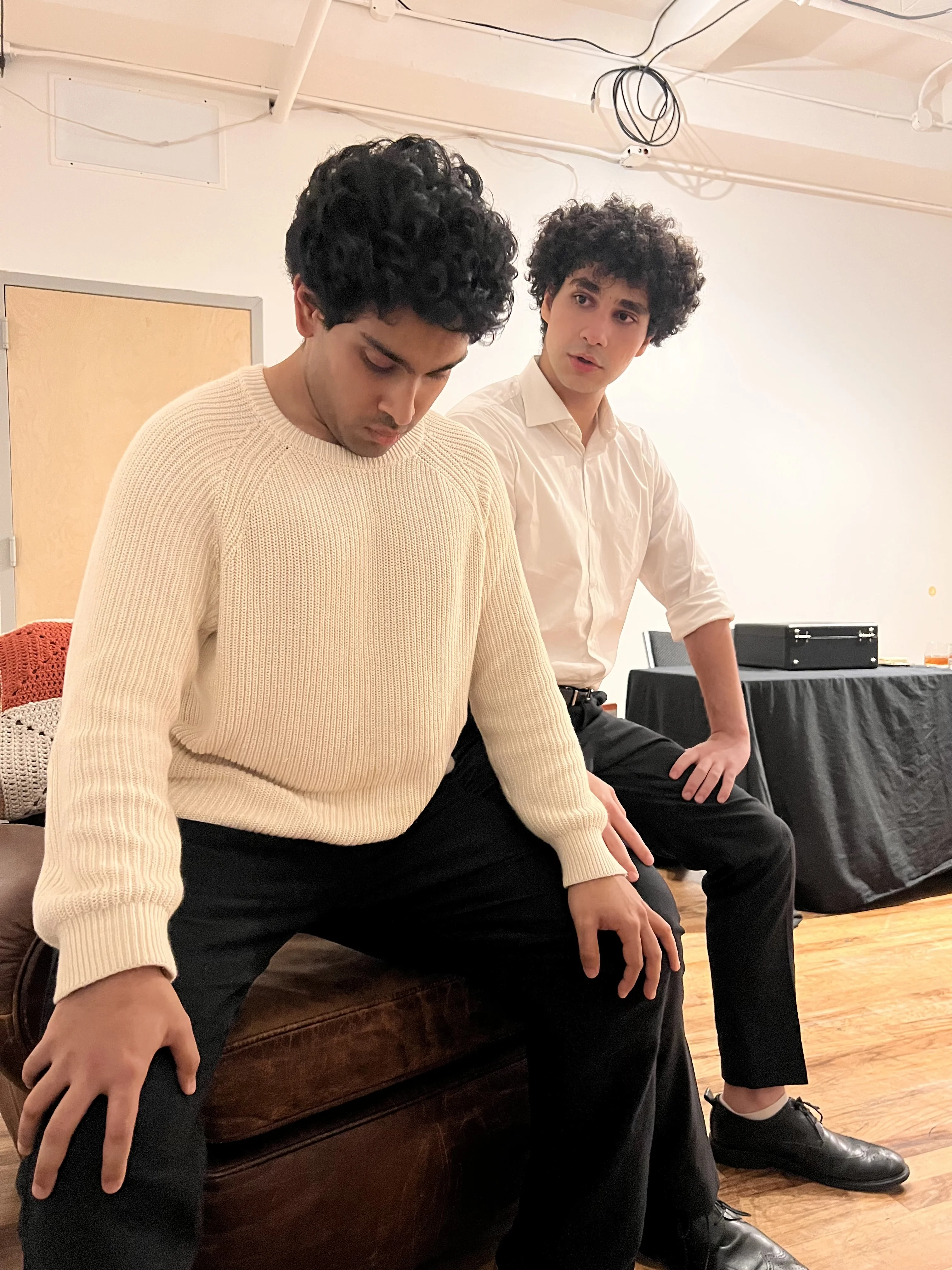 Three men with one sleeping - candid moment